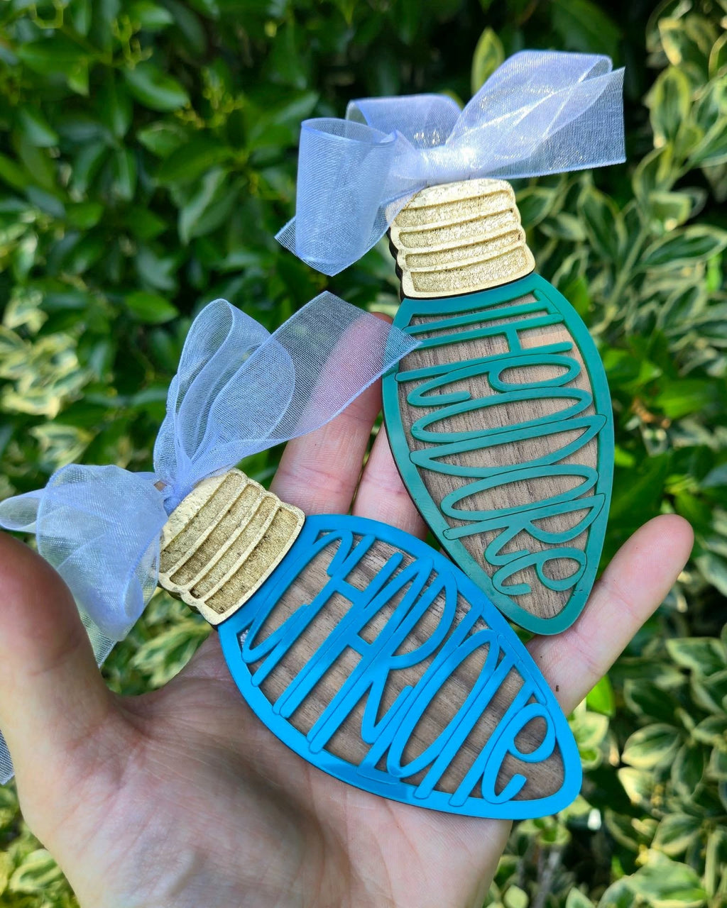 Personalized Christmas name ornament made from wood and mirrored acrylic